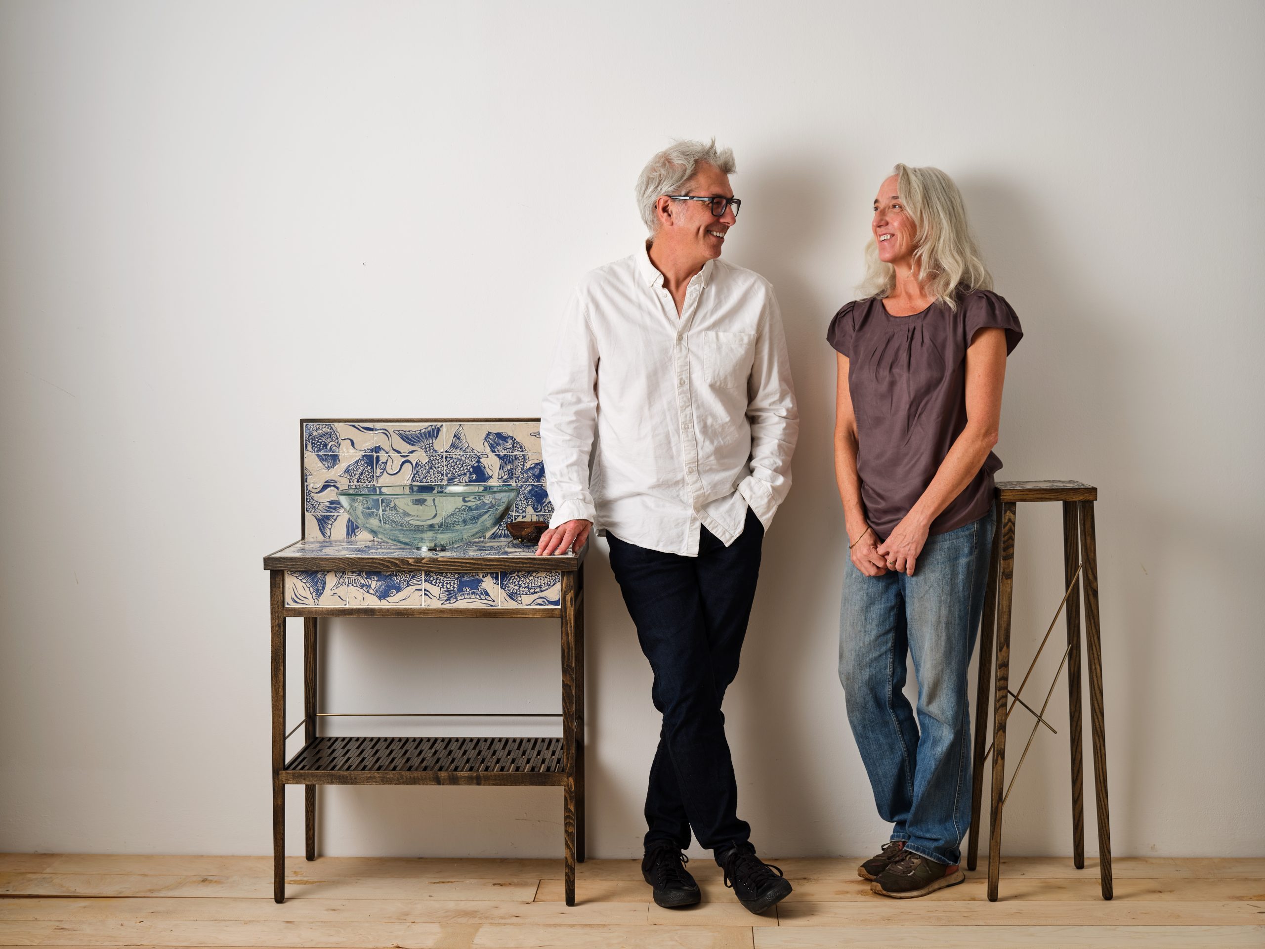 Gavin McClafferty and Jonquil Cook with their Rill Basin and Stem Pedestal pieces. Looking at each other